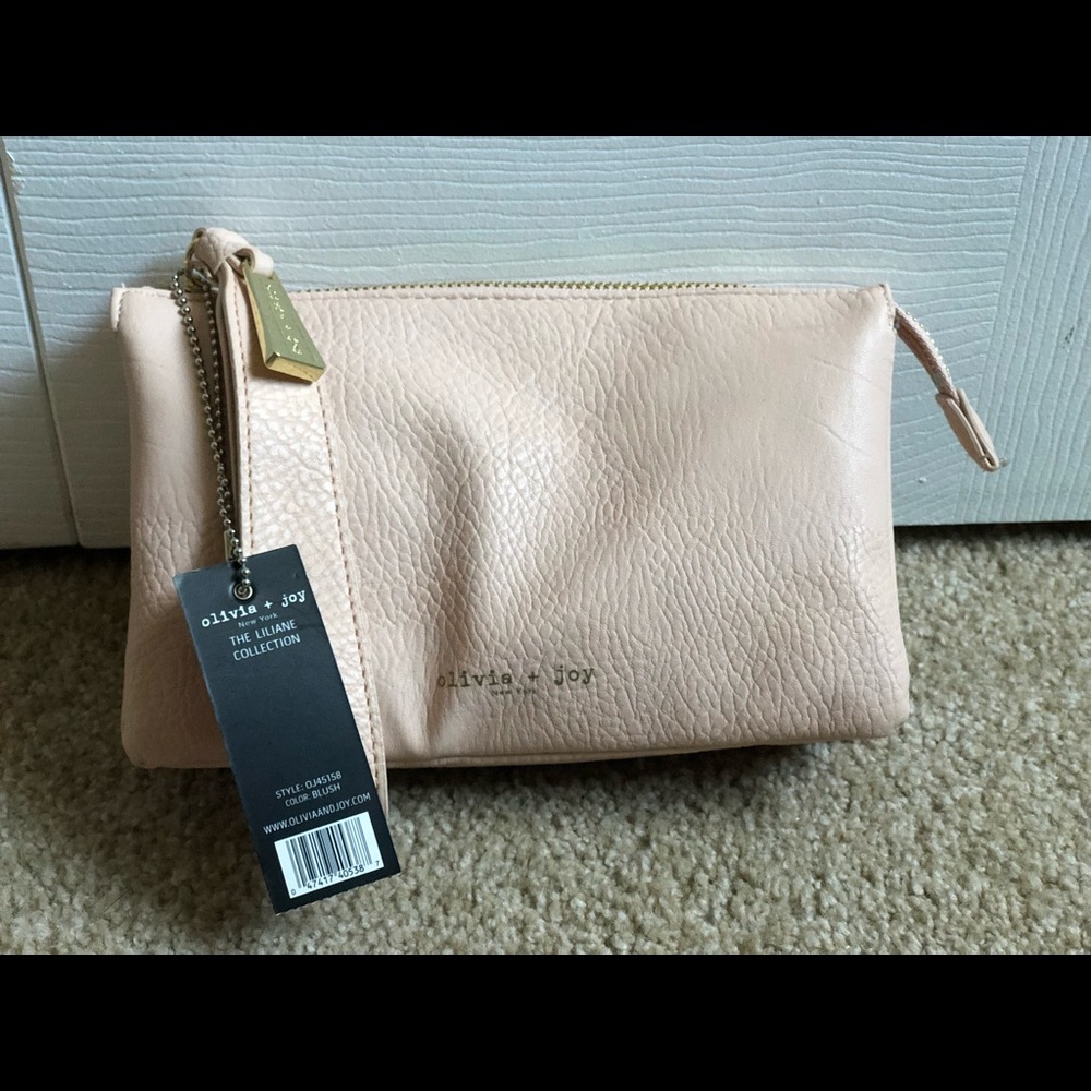 NWT Olivia Joy blush pink wristlet-clutch